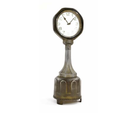 Small German silvered brass mystery mantel clock timepiece, the 2.75" glass dial supported upon a column and planished bell s