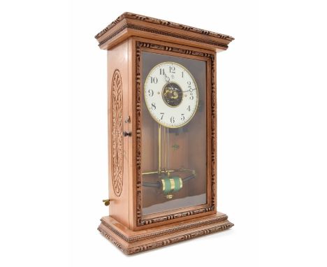 Early Bulle electric clock, the 5.25" white chapter ring bearing the MFB maker's trademark logo and enclosing a skeletonised 