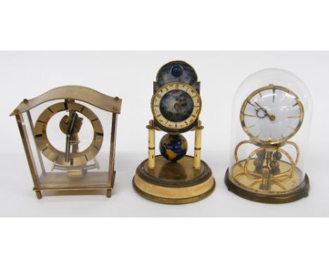 Kaeser Torsion World Time mantel clock with zodiac signs, the 3.25" white chapter ring enclosing a celestial dial plate over 