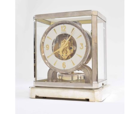 Jaeger LeCoultre Atmos clock, the 4.75" white chapter ring enclosing a skeletonised centre bearing the ser. no. 19473, within