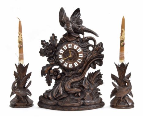 Black Forest Linden Wood style mantel clock garniture, the 4.5" turned dial with Roman cartouche enamel numerals, inset into 