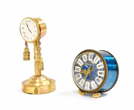 Bueche Girod miniature alarm clock with centre seconds, within a drumhead casing with blue metal starred sides, 1.25" diamete