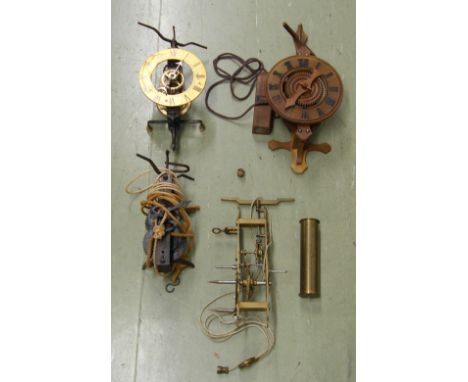 Foliot verge wall clock, the 5.5" brass chapter ring enclosing a skeletonised centre, 11.5" high overall; also two other simi