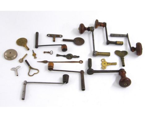 Box of various crank handle and other clock keys etc