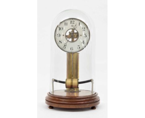Bulle electric mantel clock, the 5.5" silvered dial enclosing a skeletonised centre, under a glass dome and upon a circular s