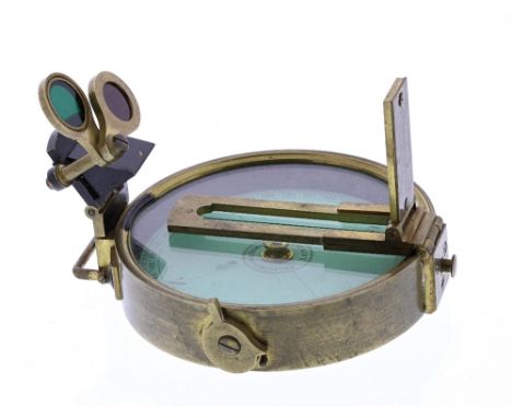 Cased pocket compass, the 2.5" white dial signed Troughton &amp; Simms, London to the centre, within a red leather travelling