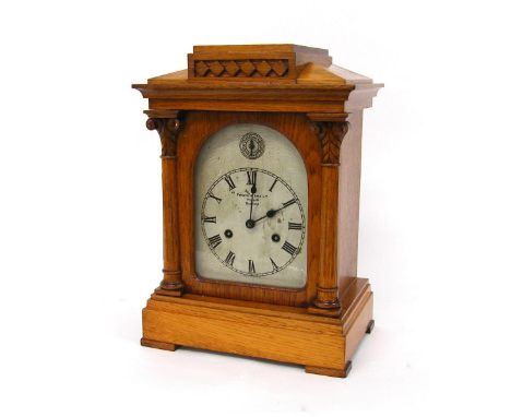 English two train mantel clock, the silvered dial signed Fattorini &amp; Sons Limited, Westgate, Bradford, the movement with 