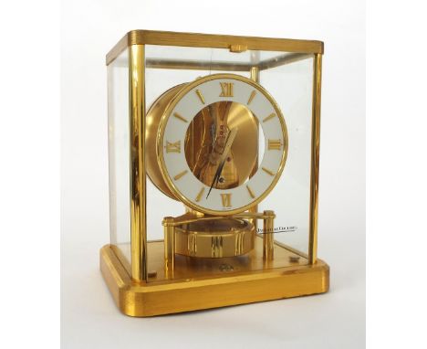 Jaeger LeCoultre Atmos clock, the 4.5" white chapter ring enclosing a skeletonised centre, ser. no. 618549, within a brushed 