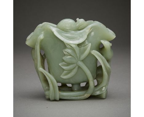 Chinese Qing dynasty carved jade libation cup decorated throughout with foliate motifs and a small bird.Provenance: Sotheby P