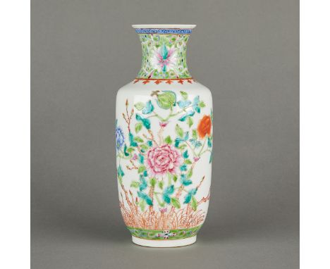 Chinese PRC (People's Republic of China) famille rose porcelain vase with an unusual green ground. Decorated with lovely bloo