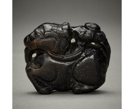 Archaic style Chinese carved jade animal, possibly a horse or other pack animal, carved from a dark material with lovely earl