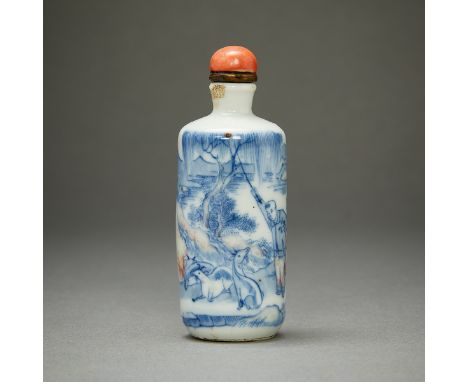 Chinese blue and white porcelain snuff bottle. Painted with a scene of a goat herder in a landscape with a calm lake in the b