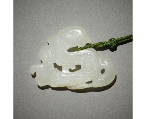Chinese carved jade pendant in form of a phoenix or bat a with squirrel or small mammal. Wonderful pierced work and polishing