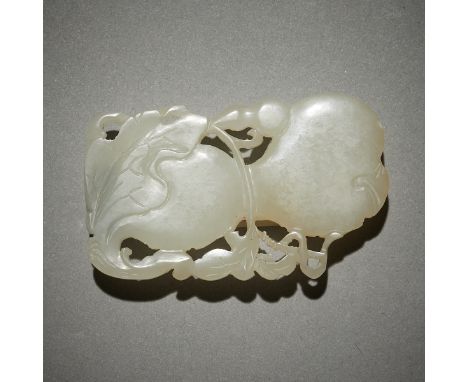Pale white Chinese jade belt slide carved in the form of a double gourd with intricate pierced vines.Provenance: Private Minn