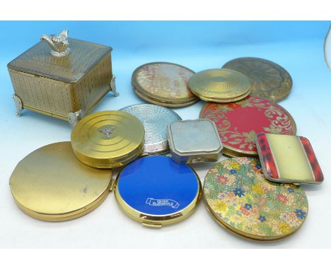 Nine compacts and a trinket box