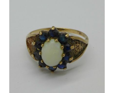 A 9ct gold, opal and sapphire cluster ring, 3.6g, Q