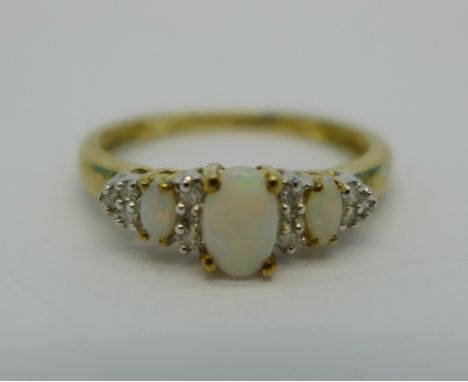 A 9ct gold, opal and diamond ring, 1.8g, Q