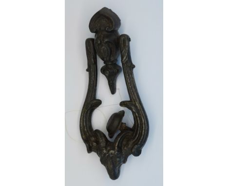 A Victorian ram's head door knocker
