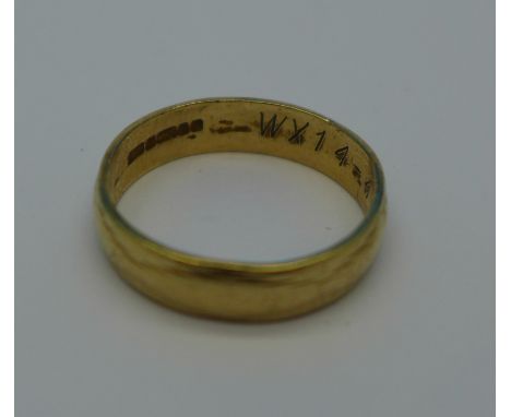 A 9ct gold wedding band, 2.1g, K