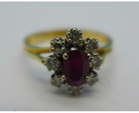 An 18ct gold, ruby and white stone ring, 2.7g, M