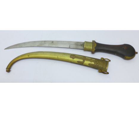 A Turkish knife with decorative scabbard