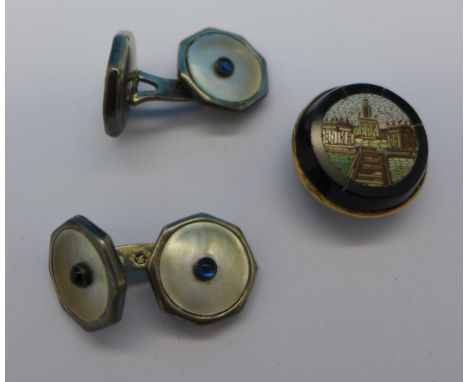 A pair of silver cufflinks and a micro mosaic button