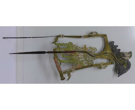 A 19th Century Indonesian shadow puppet with horn handle
