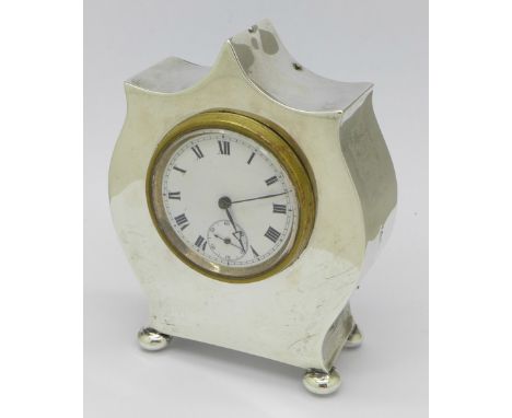 A silver bedside clock, Chester, height 9cm, dent to the top