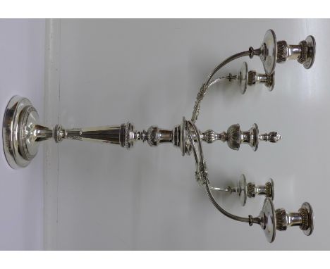 A silver candlestick with Sheffield plate top, Sheffield 1814, height of candlestick 38cm