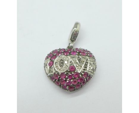 A 9ct gold, diamond and ruby heart shaped 'Love' pendant, 2.4g