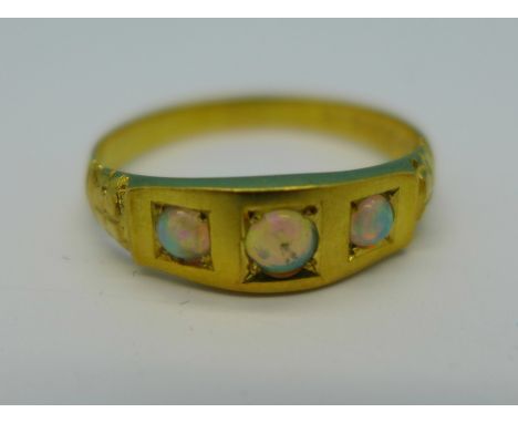 A 15ct gold and three stone opal ring, Chester 1901, 2.5g, R