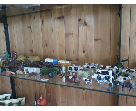 A Tri-ang Tractor, 2 Corgi Horse boxes together with a collection of lead farm animals  buildings
Condition report: Enamel lo