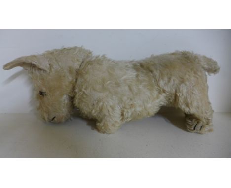 A vintage Steiff Mohair dog, in standing pose, 46cm - with some repair