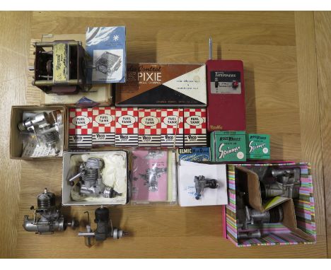 Seven model aeroplane engines, six veco fuel tanks, two Keil Kraft screw on spinners, a Pathfinder transmitter, a boxed Elmix