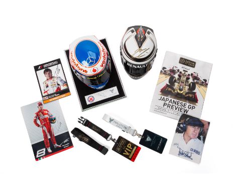 A GROUP OF FORMULA 1 COLLECTIBLES
Comprising a miniature Kimi Raikkonen helmet signed at the Lotus pits, 2012 Japanese Grand 