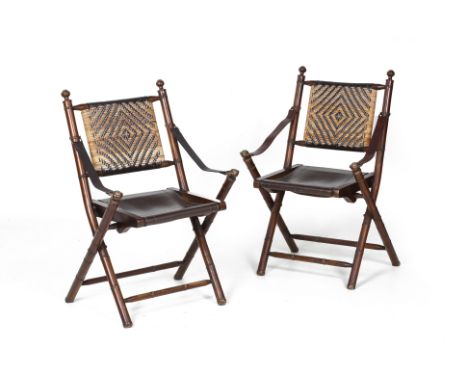 A PAIR OF FOLDING CHAIRS
With a rattan diamond decorated back, leather seat and arms with faux bamboo style supports
89cm x 5