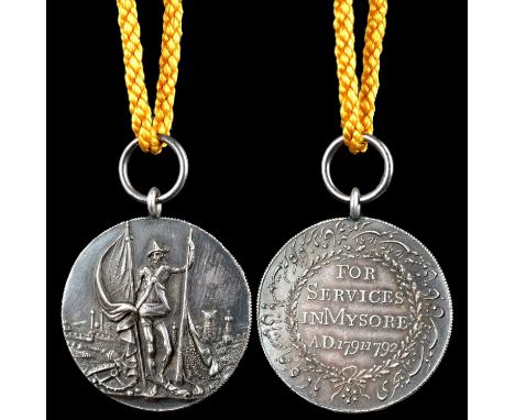 Honourable East India Company: Mysore Medal 1790-92, silver, small ring suspension, good very fine or better.39.1mm diameter