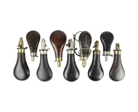 A quantity of rifle and other sporting powder flasks, including: a Hawksley patent rifle flask with leather covered steel bag