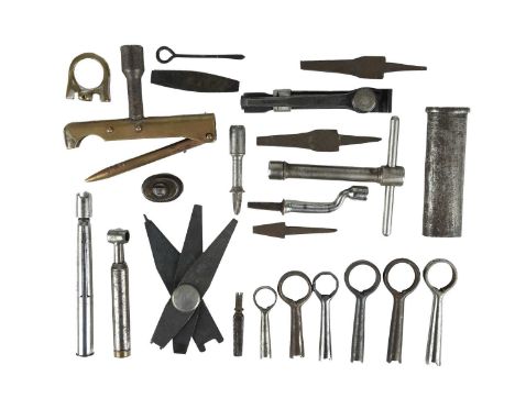 Various vintage and military firearms maintenance tools, including: a Martini-Henry action implement, functions including dri