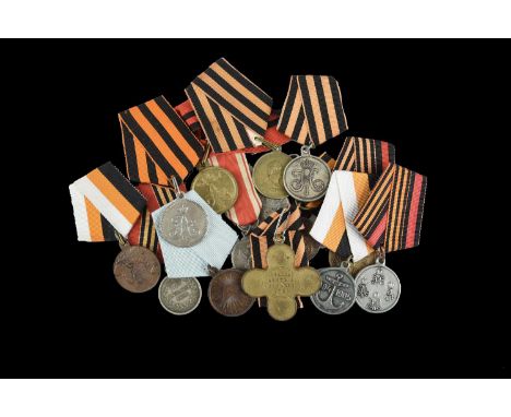 A collection of 19th century Russian medals, including: Ochakoff Cross 1788, medal for the taking of Warsaw 1831, Mouraviev C