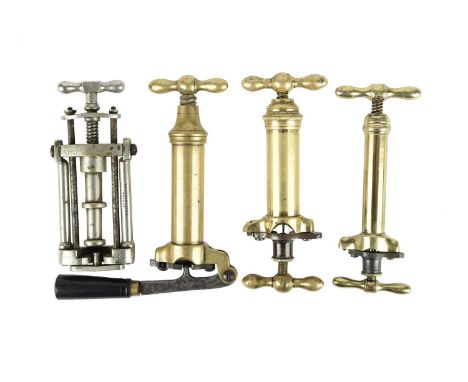 Four vintage cartridge de-capping and re-capping tools, vis.: a Greenfield patent tool, nickel plated, axial rod tilting with