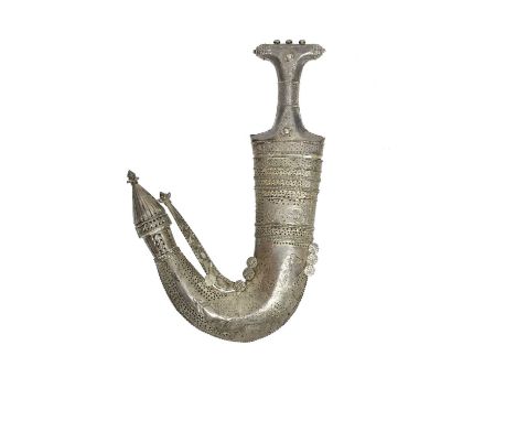 A Yemeni dagger (jambiya), broad blade 7.5 in. with medial ridge, scabbard of characteristic deeply curving form rising to a 
