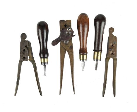 Three vintage brass bullet moulds for casting cannelured bullets, each with steel sprue cutter: the first with a single cavit