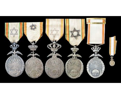 Spain: Medal for the Pacification of Morocco, 1909-27, white metal oval, 32.3 mm, an urban landscape within a crescent marked