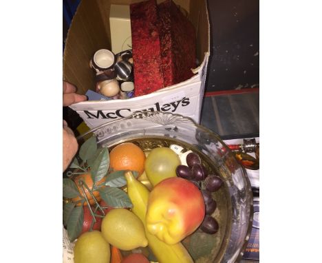 A brass stand on column feet with bowl of artificial fruits and a box of misc glass, Caithness, ornaments and pottery to incl