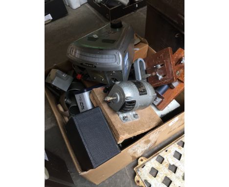 A box of various scientific equipment including a light sensor, scalamp galvanometer, a smoothing unit, etc. 