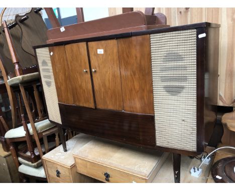 A vintage music center cabinet with Garrard turntable 