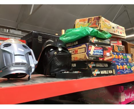 Quantity of vintage games, a Darth Vader mask with remote and a Cyberman mask 