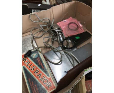 A box with vintage microphone, razor, etc. 