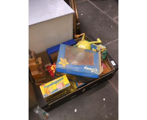 A box of vintage toys to include Dumbo the flying elephant, Tomy, etc. 